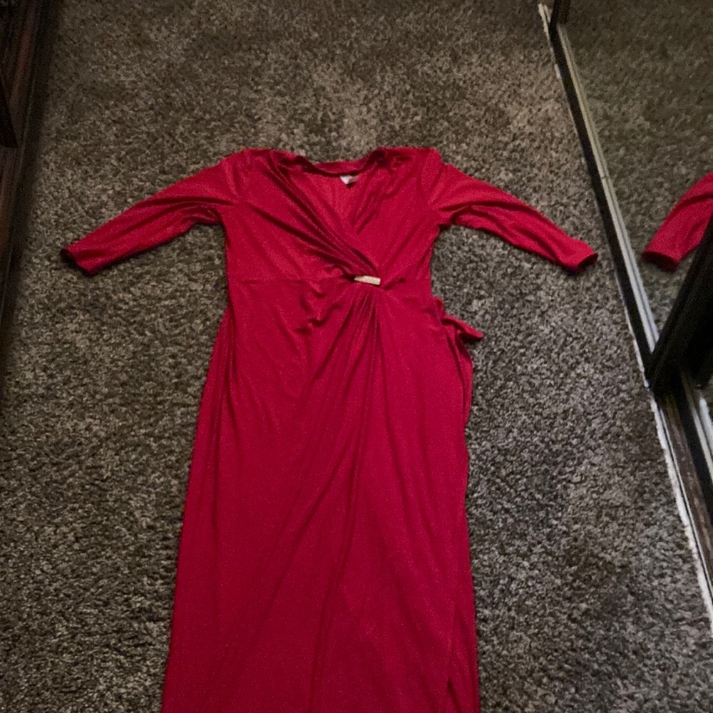 It is a red dress and long. The material is like silky.